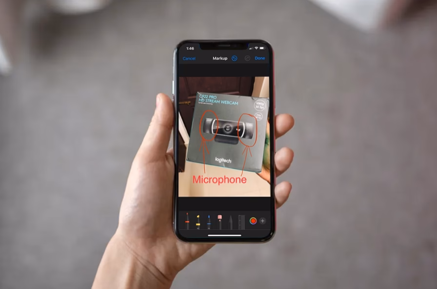 How do I add text to a photo on my iPhone?