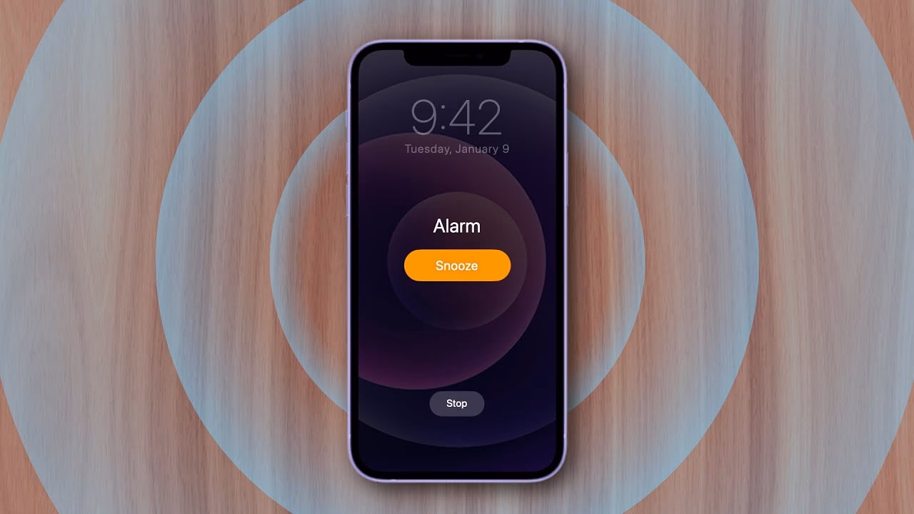 How do I find the alarm clock on my iPhone?