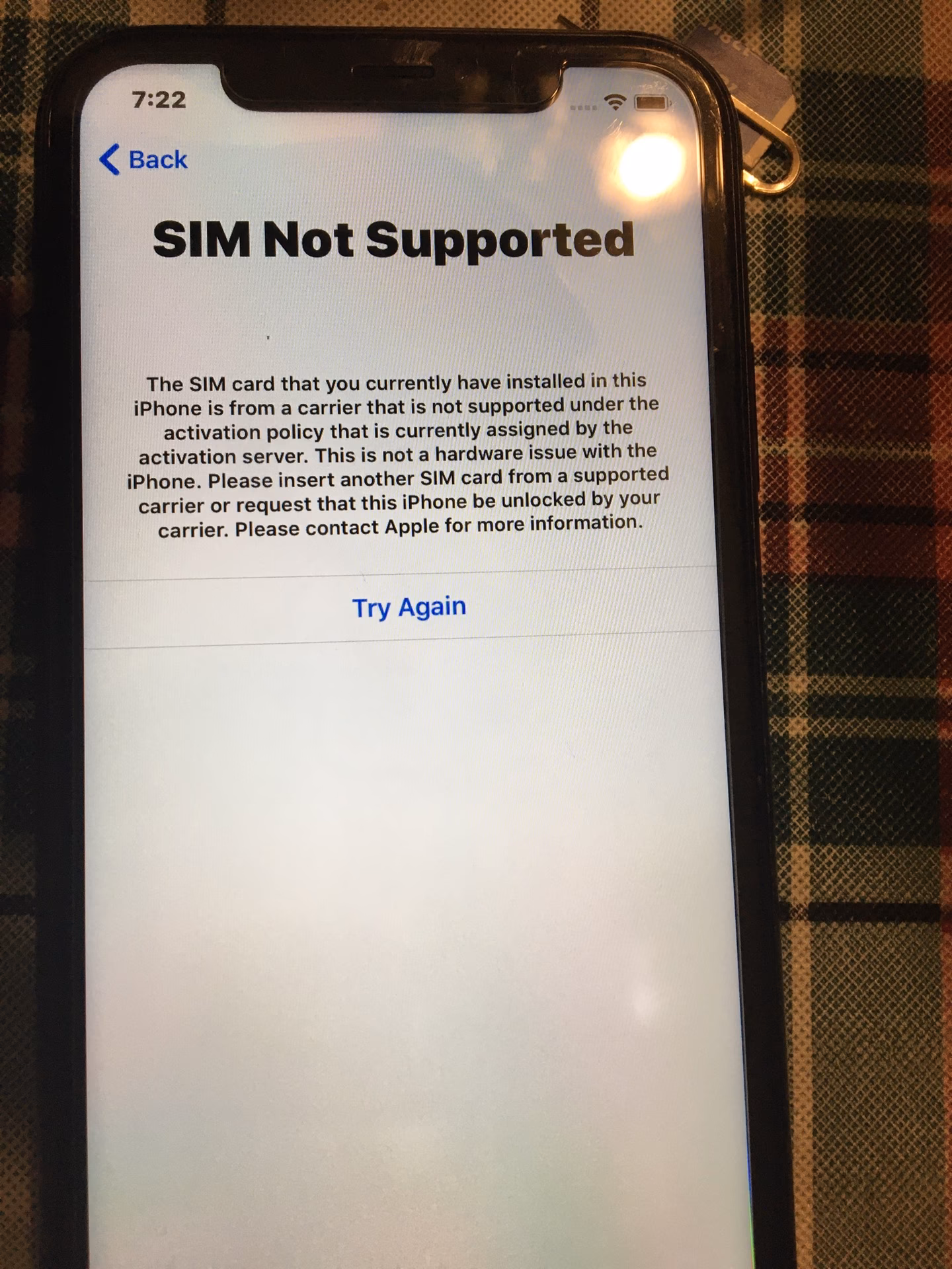 How does a PIN code secure the SIM card in iOS 12?