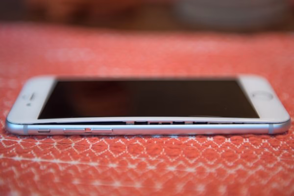 How do you charge an iPhone with a hair dryer?