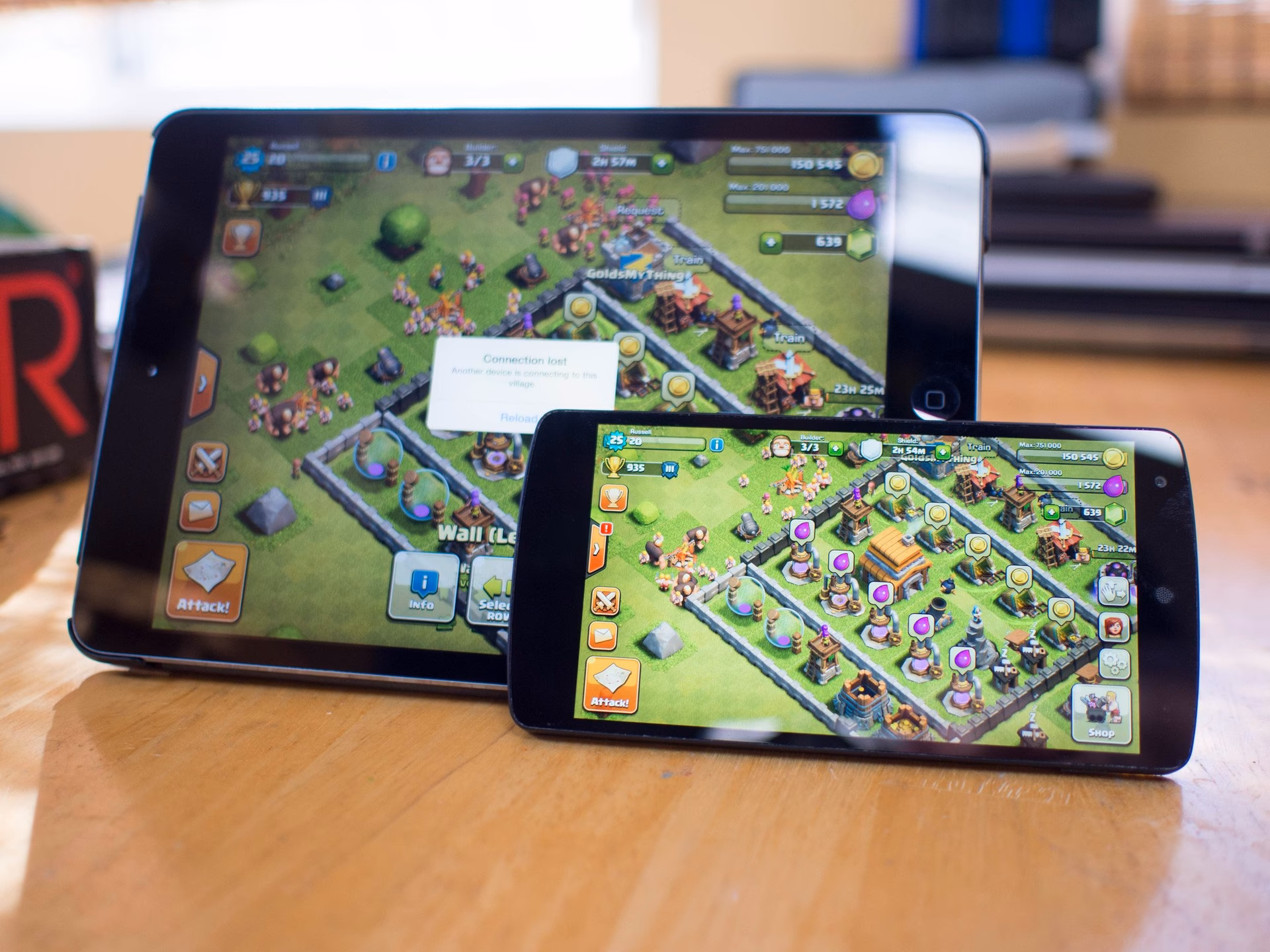How do I sync Clash of clans between Android and iOS devices?