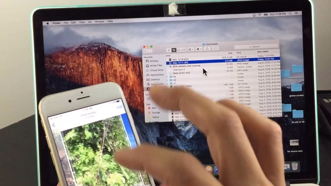 How do I transfer files from iPhone to Mac using airdrop?