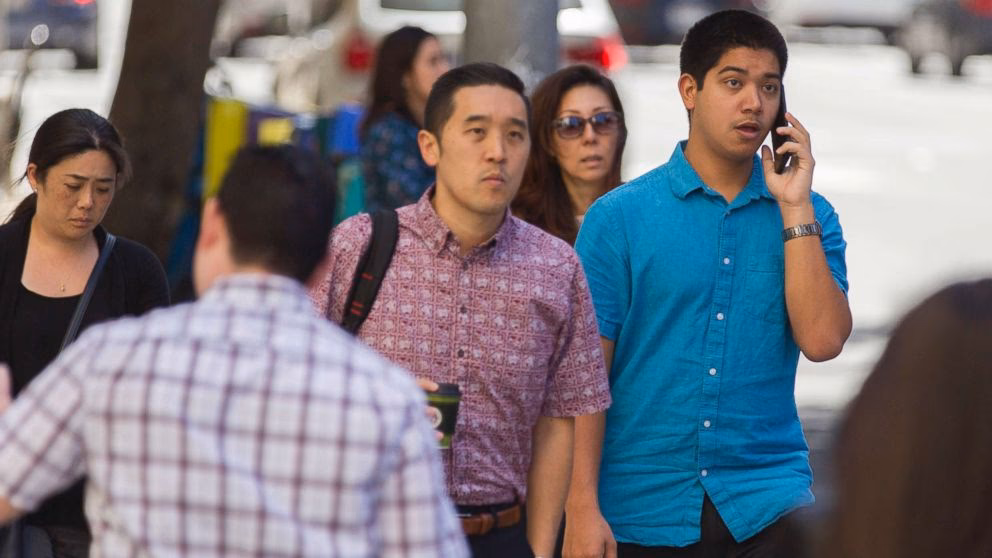 Is it illegal to use a handheld device in Hawaii?