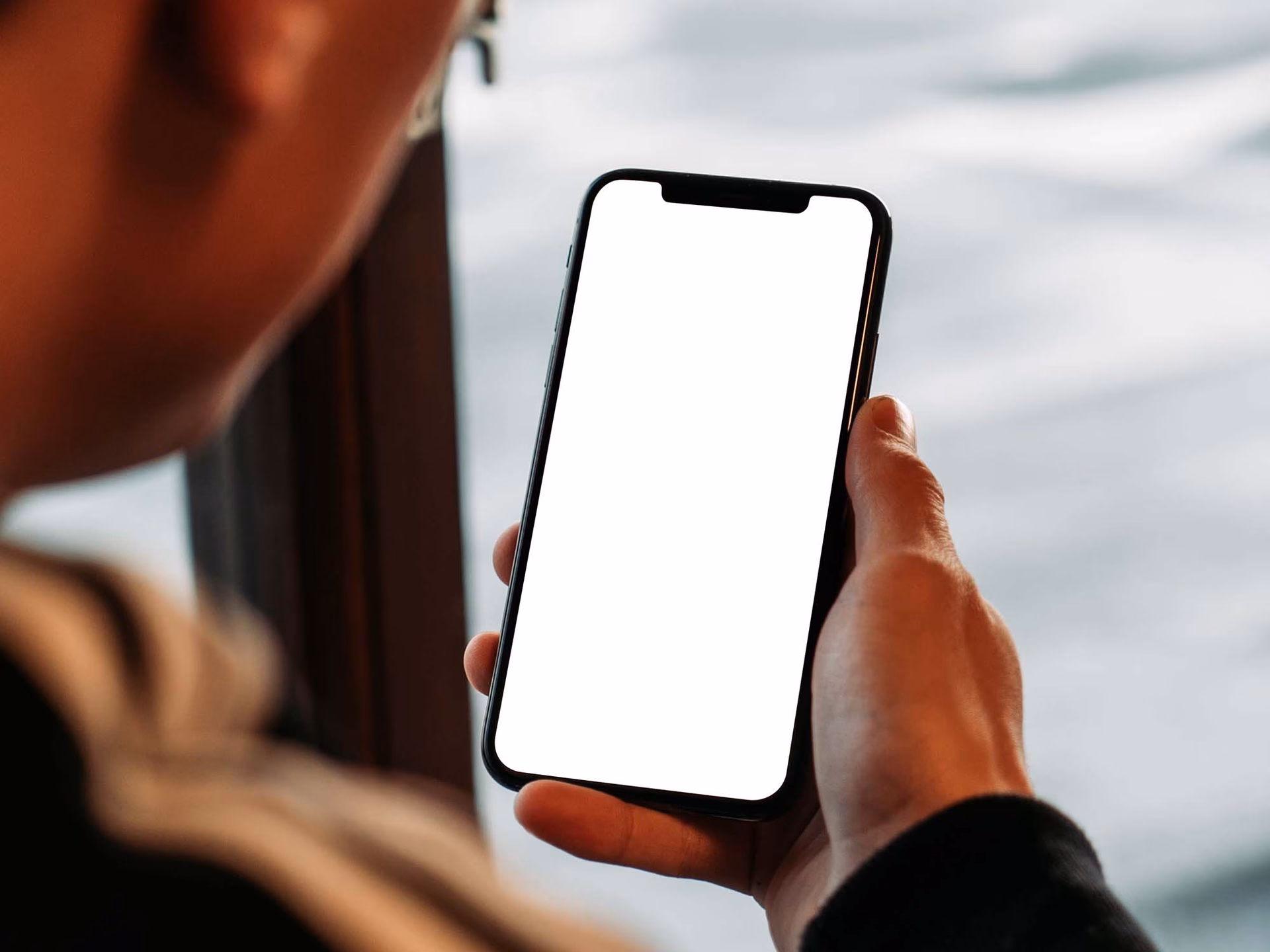 How many holding iPhone stock photos are there?