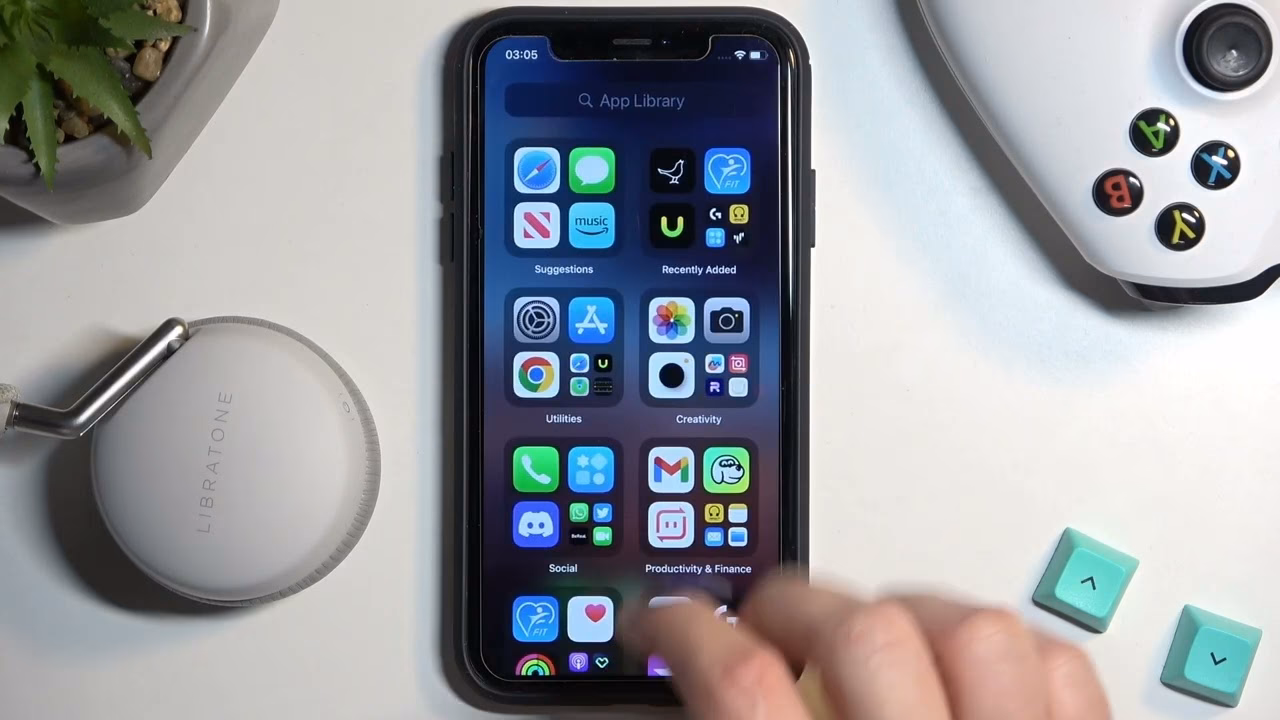 How do I connect my libratone speaker to my iPhone?