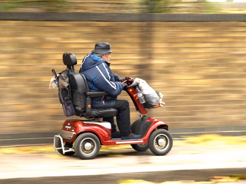 How do I qualify for a mobility scooter?