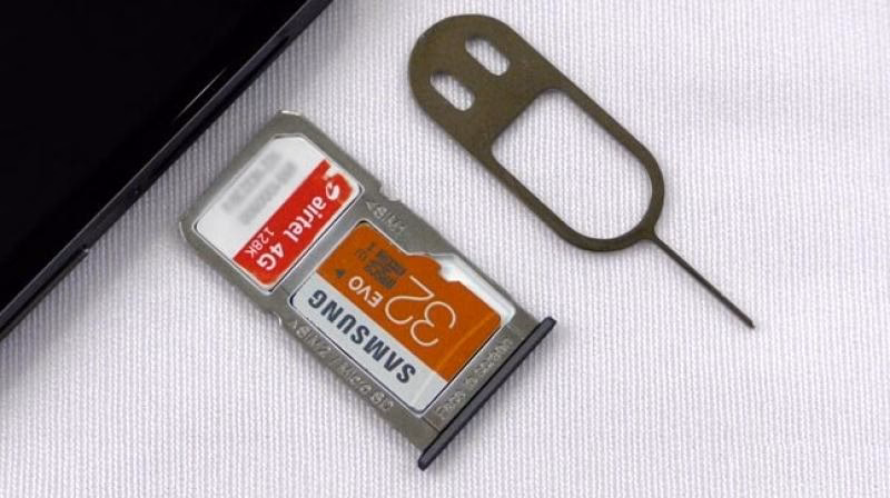 Can a hybrid SIM card slot fit a microSD card?