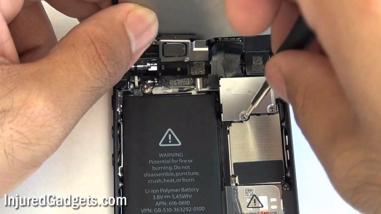 How do you close the Camera app on an iPhone 5?