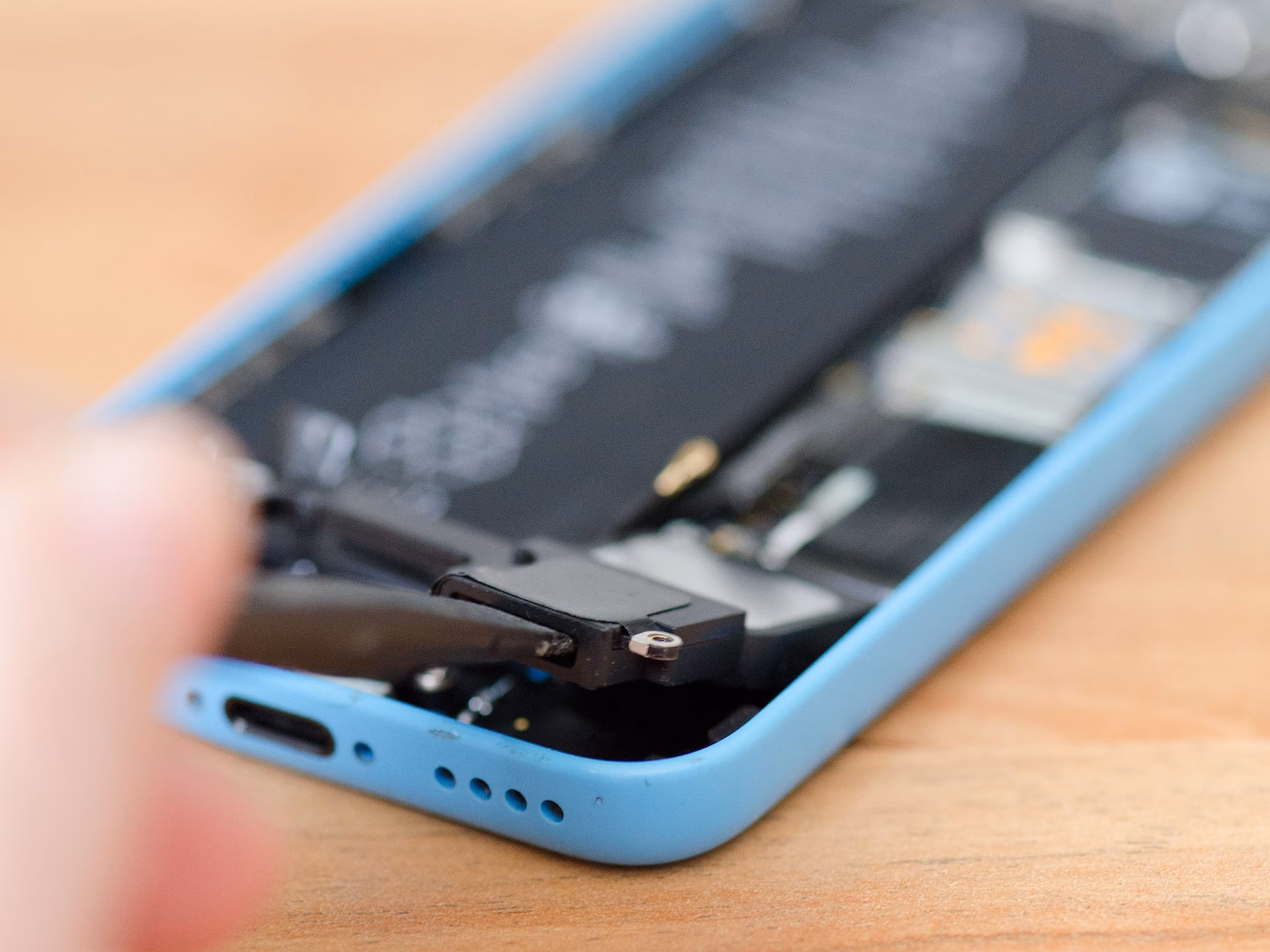 Can I use headphones if my iPhone has water damage?