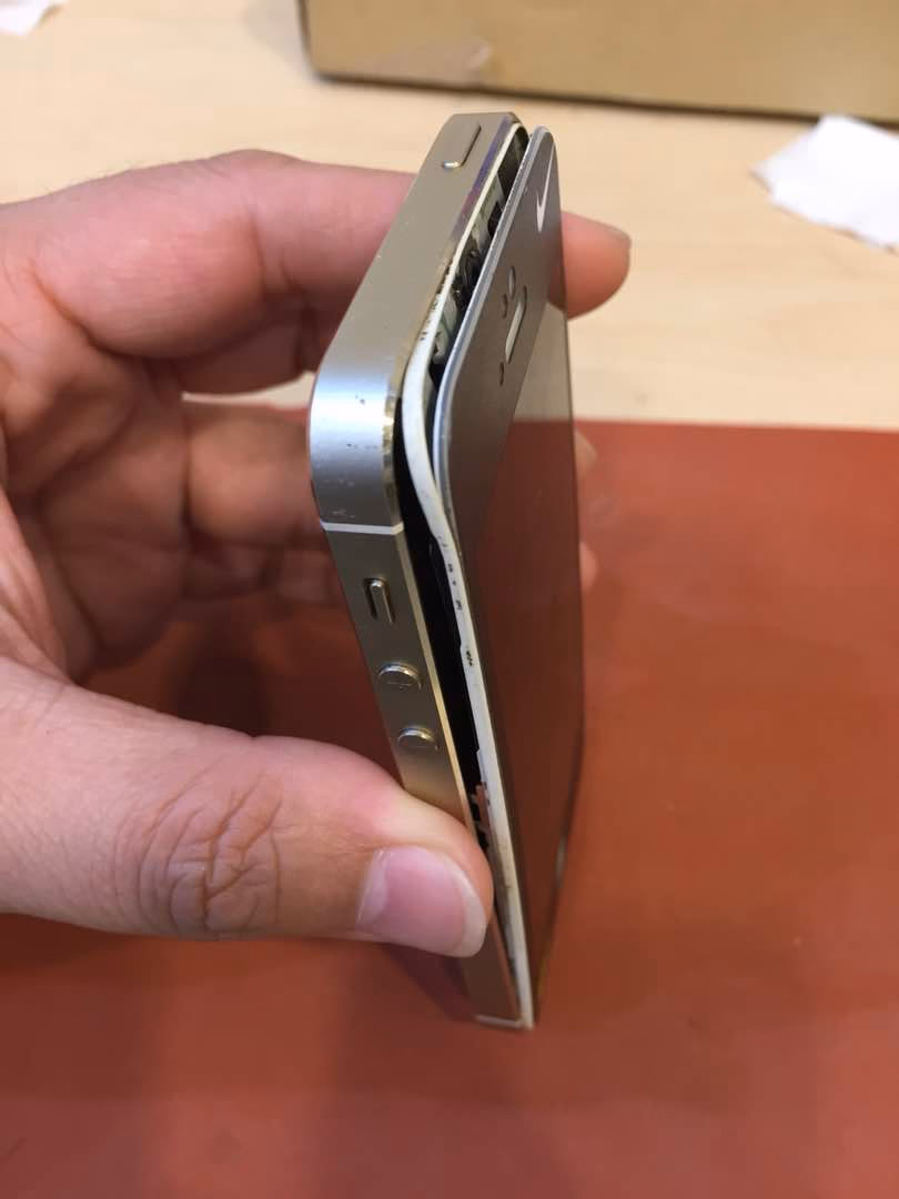 Why is my iPhone screen popping out?