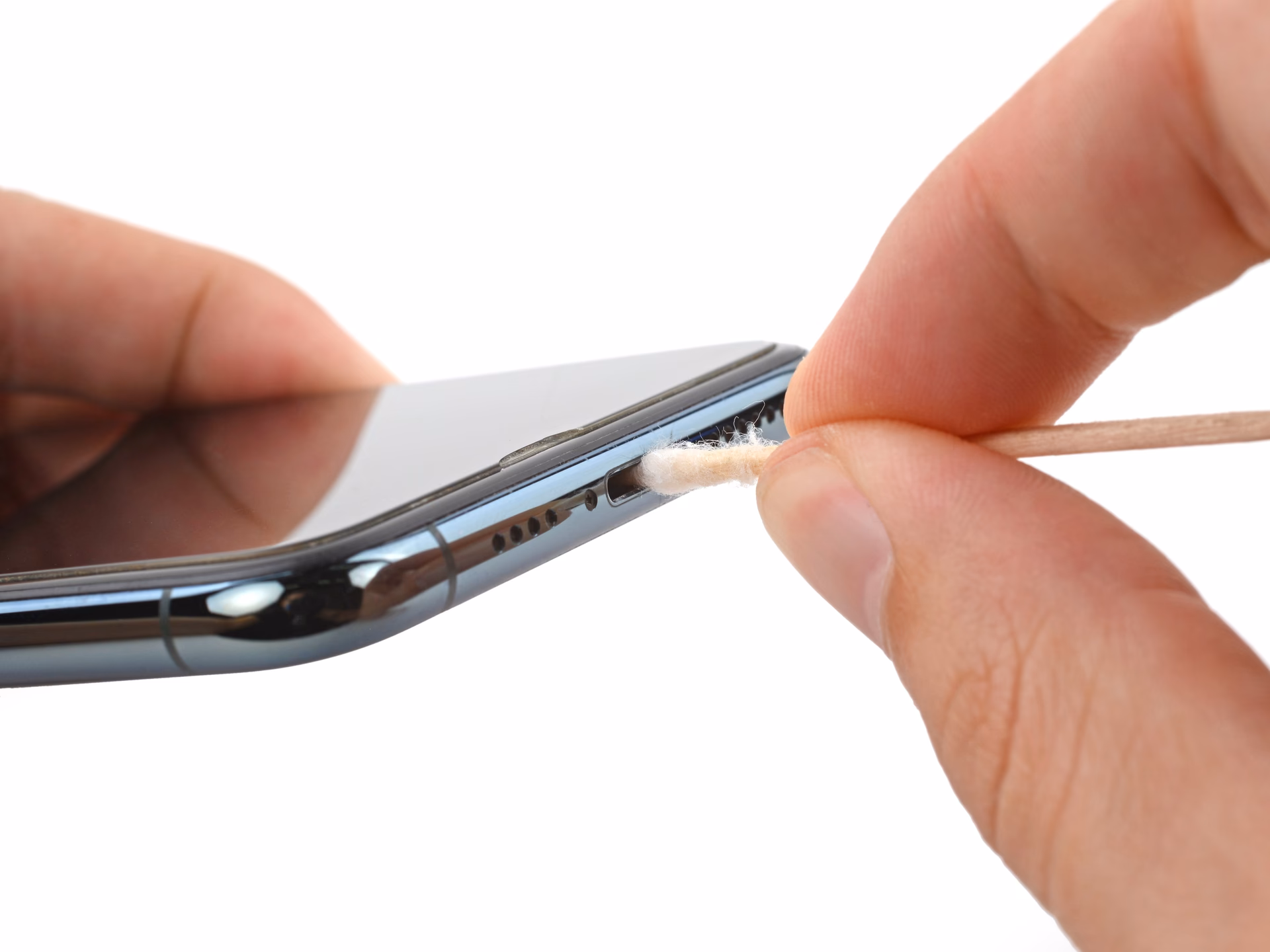 How do you clean an iPhone's charging port?