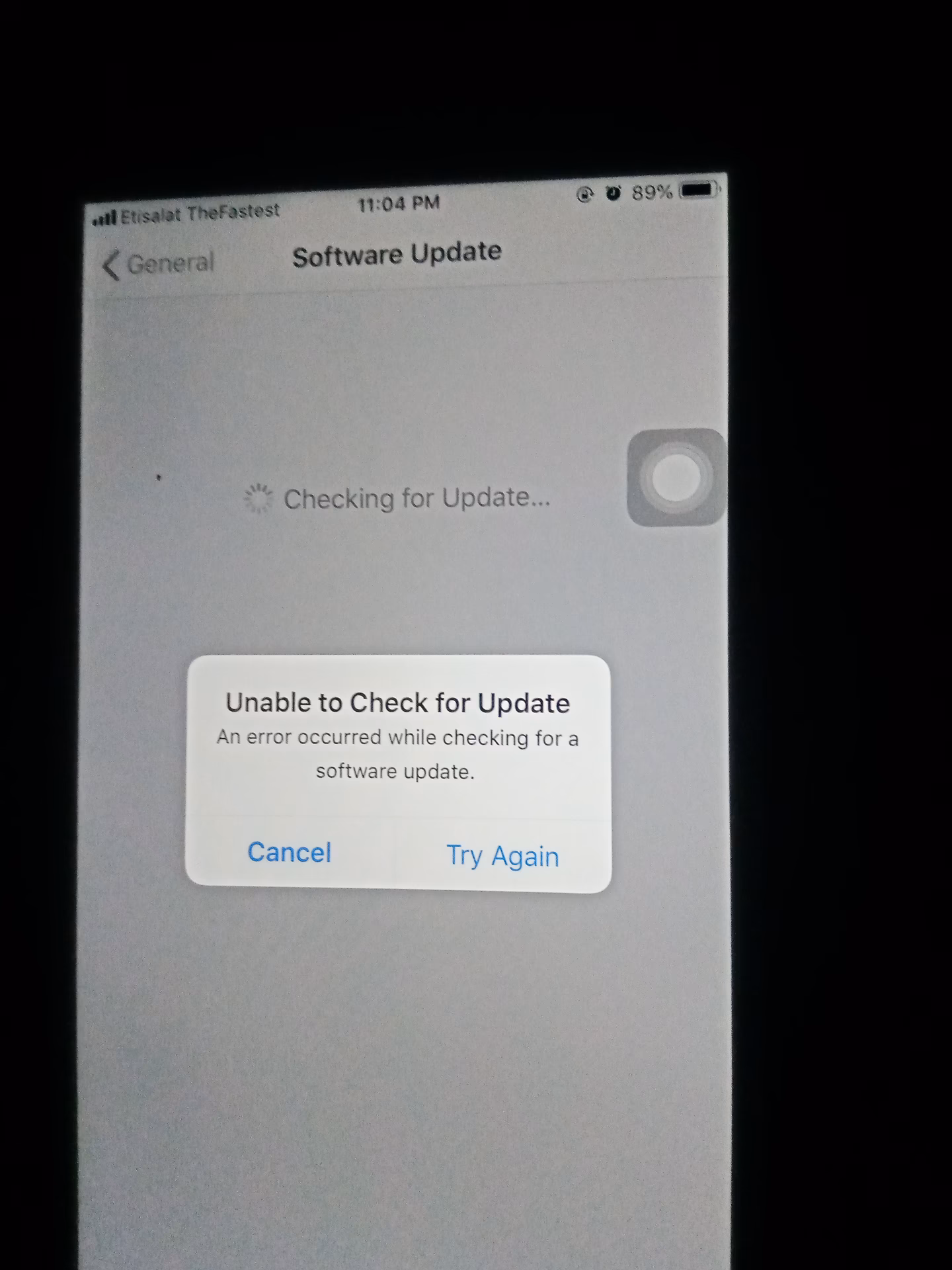 How do I fix a stuck iOS update?