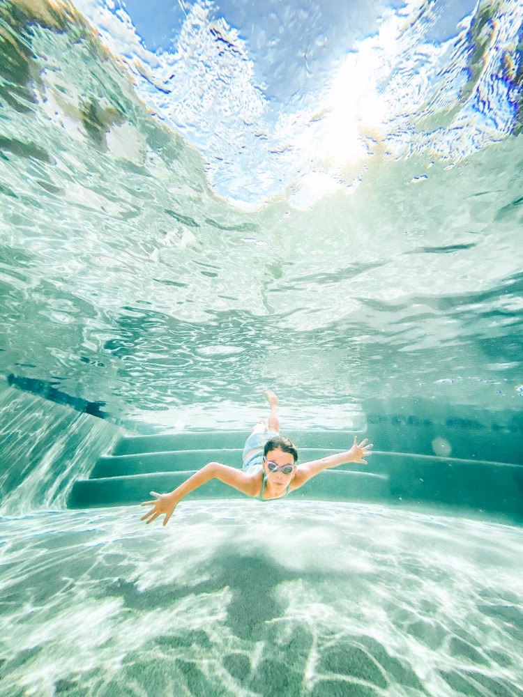 Can I put my iPhone in the water to take photos?