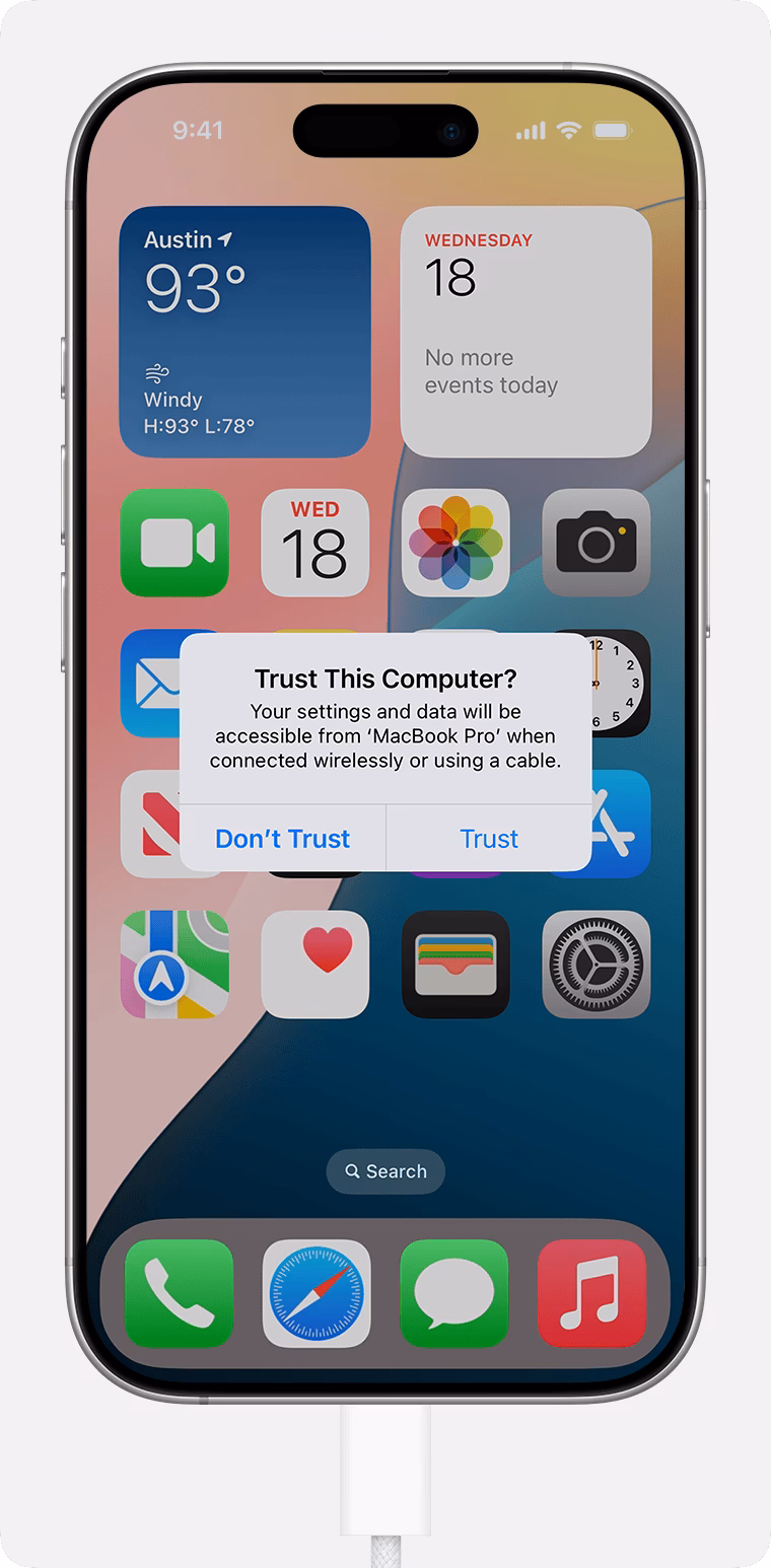 Why does my iPhone ask if I trust a new computer?