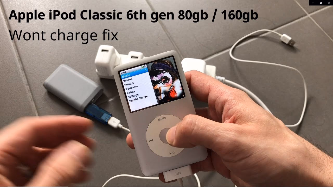 How do I charge my iPod Touch?