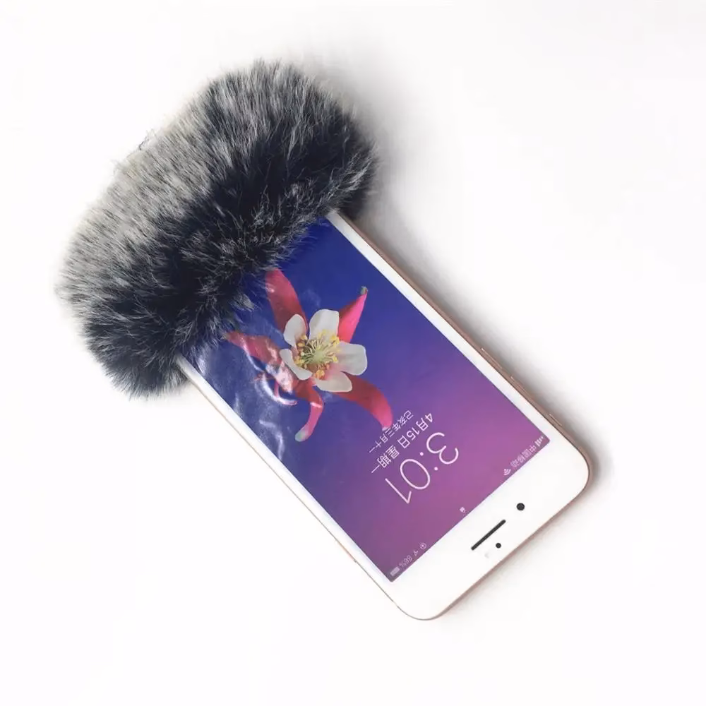 What is a microphone windscreen made of?