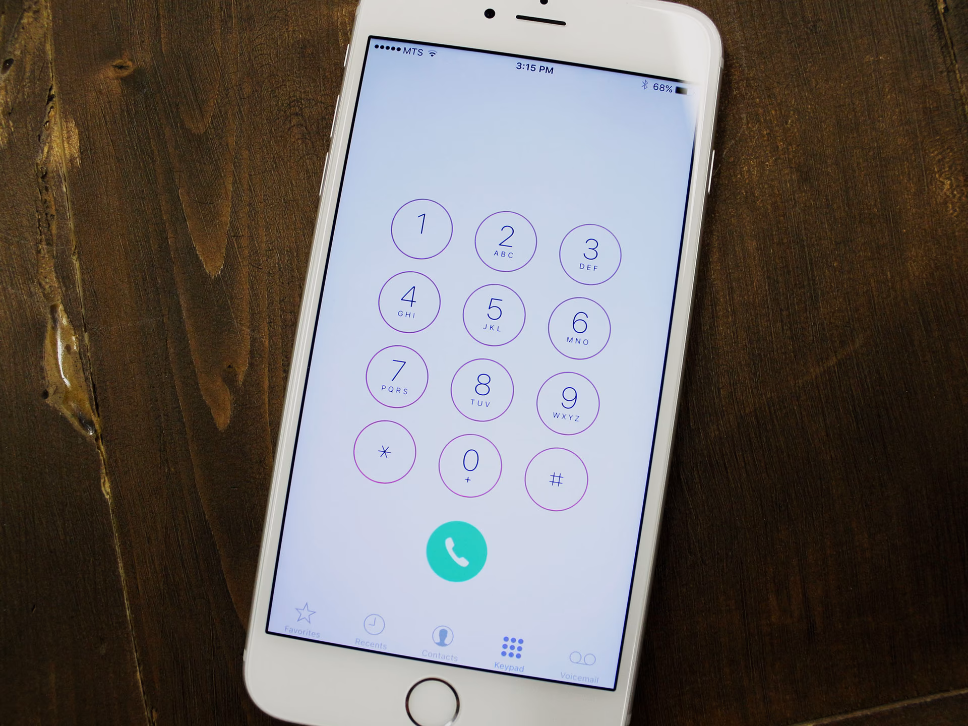 How do I make a phone call on my iPhone?
