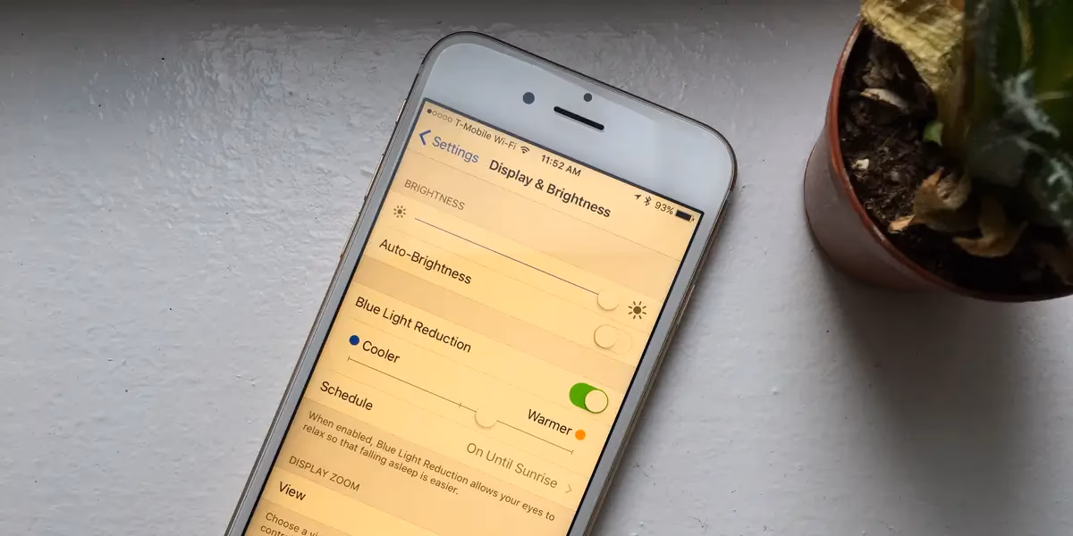 How do I change the brightness on my iPhone?