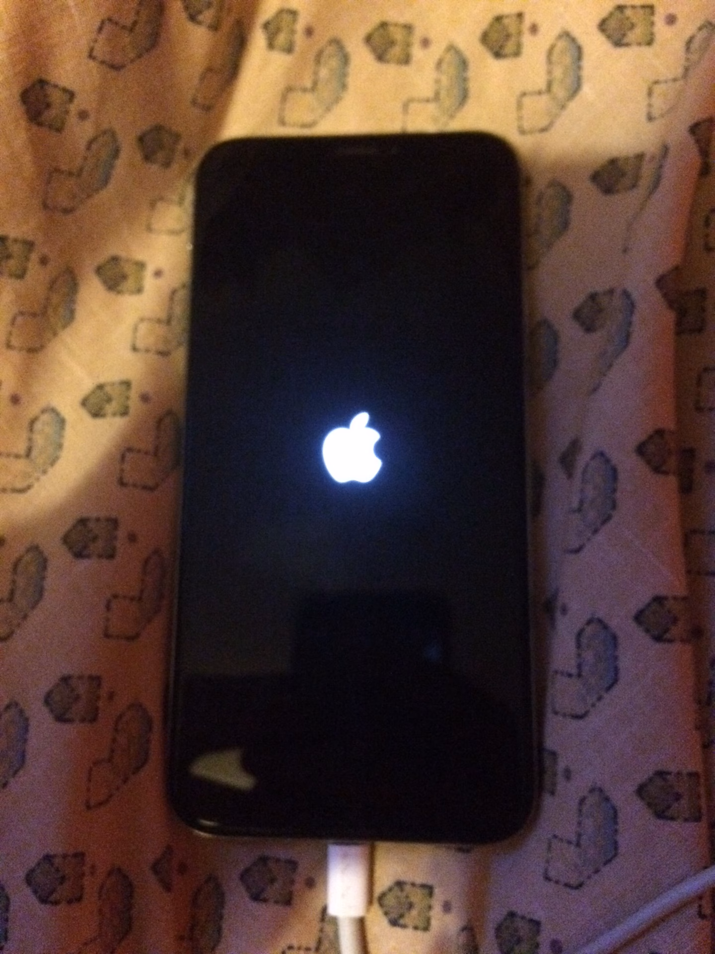 How do I Reboot my iPhone?