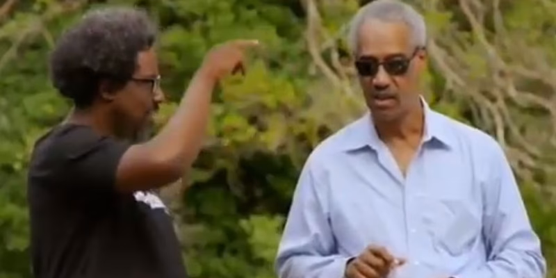 Is Kamau a stand-up comic?