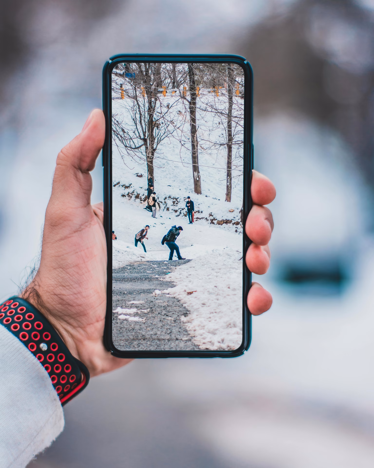 How do you take a picture on a mobile phone?