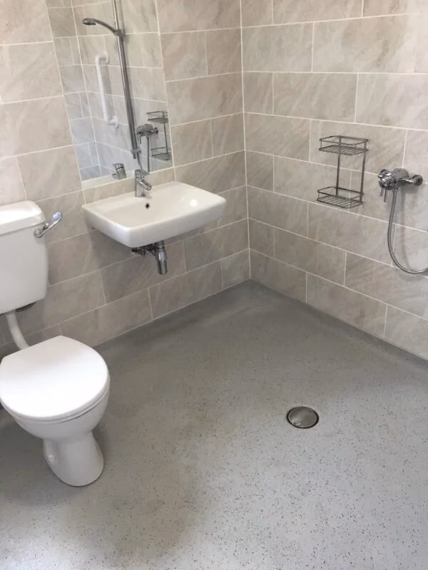 Can Mobility Plus make a wet room in a small bathroom?