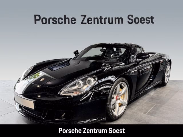 How many miles is a Porsche Carrera GT?