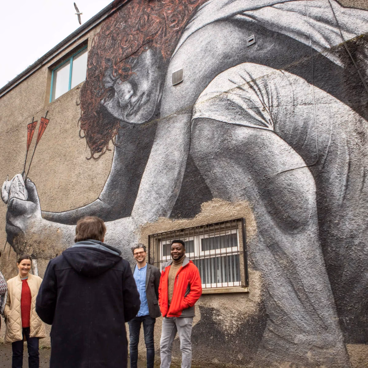 How can I discover Belfast's street art heritage?