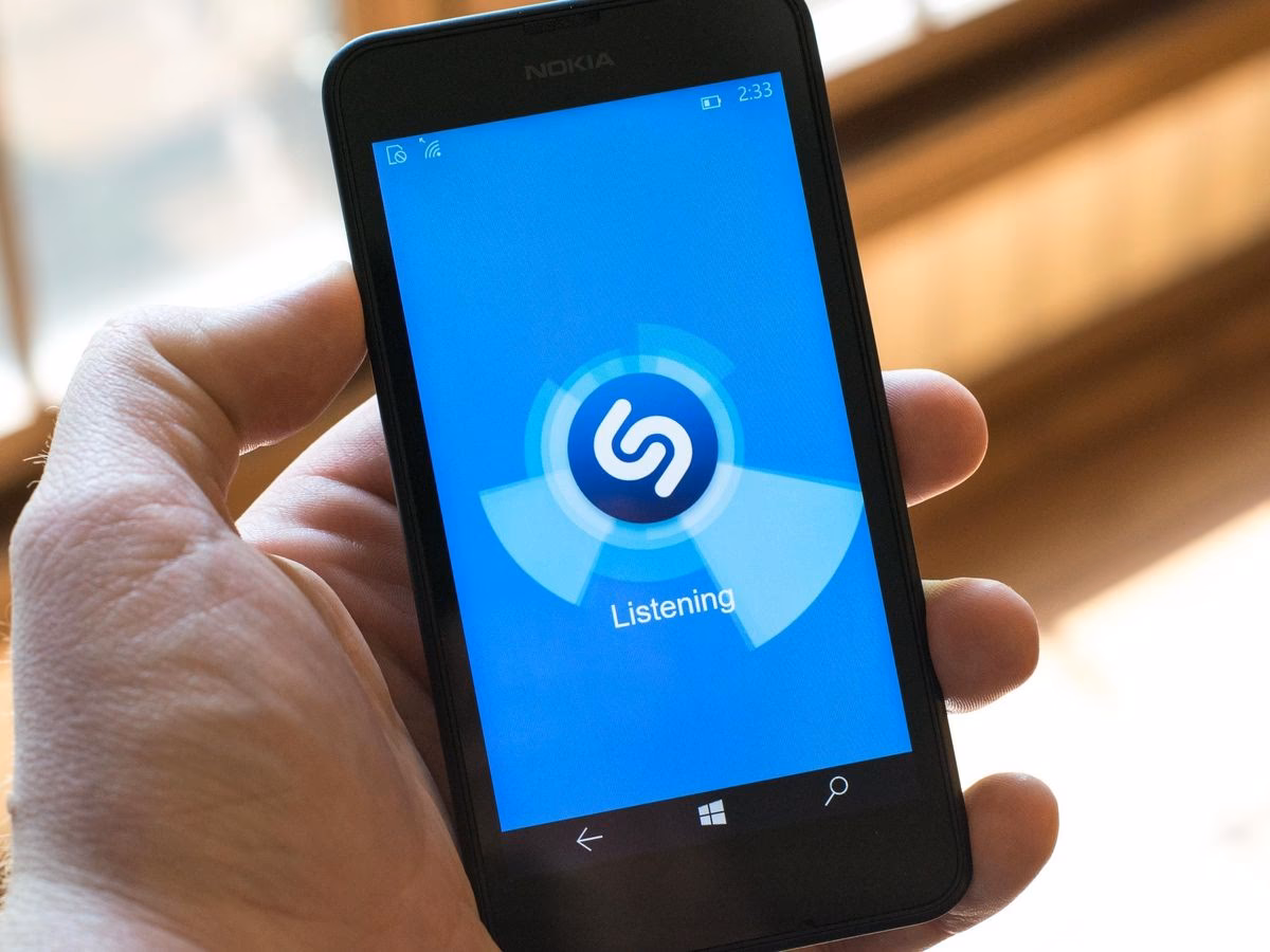 How do I use Shazam on my iPhone?