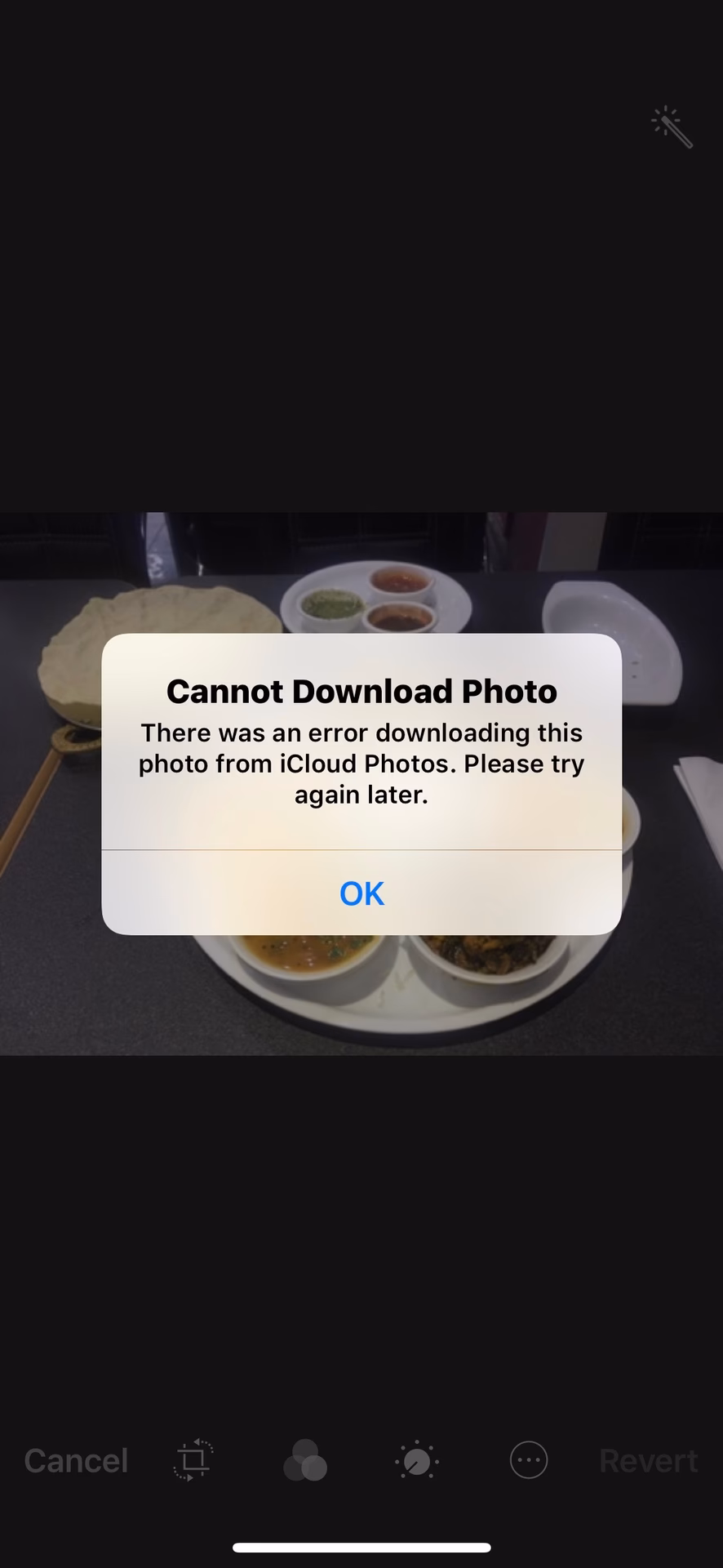 Why is iCloud Photos not downloading?